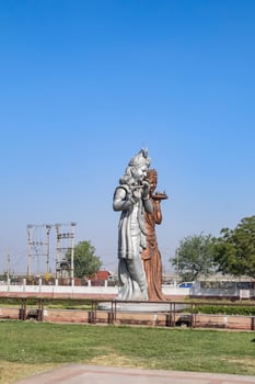Big statue of Lord Radha Krishna near Delhi International airport, Delhi, India, Lord Krishna and Radha big statue touching sky at main highway Mahipalpur, Delhi photo