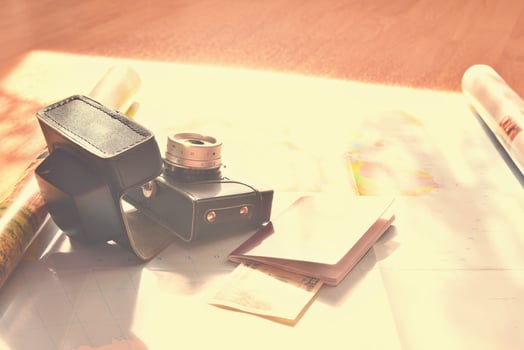 Beautiful concept for summer travel. Map with sunset and accessories for vacation planning. photo