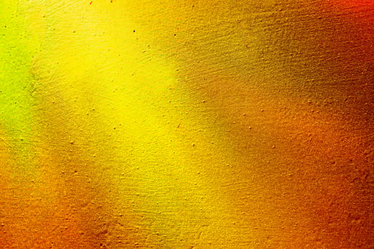 Colorful graffiti painted on a wall. Abstract urban background. Spray painting art. photo