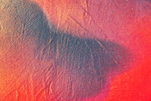 Colorful graffiti painted on a wall. Abstract urban background. Spray painting art. photo