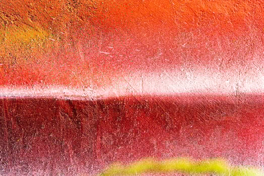 Colorful graffiti painted on a wall. Abstract urban background. Spray painting art. photo