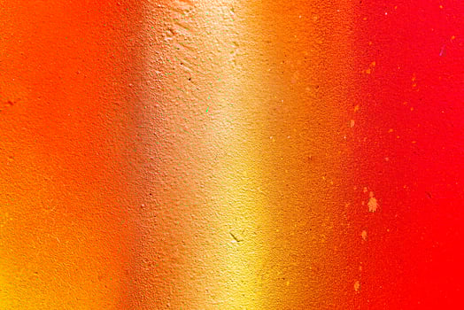 Colorful graffiti painted on a wall. Abstract urban background. Spray painting art. photo