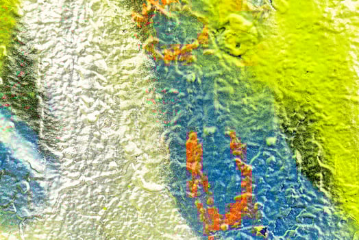 Colorful graffiti painted on a wall. Abstract urban background. Spray painting art. photo