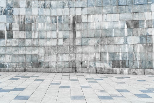 Texture of stone wall covered with tiles and pavement. photo