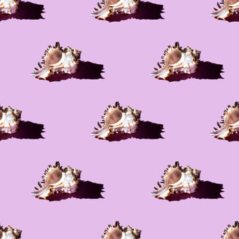 Seamless pattern of clam shells on a pastel pink background. photo