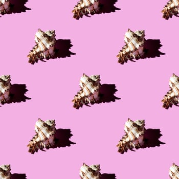 Seamless pattern of clam shells on a pastel background. photo