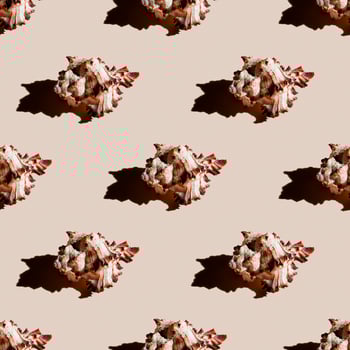 Seamless pattern of clam shells on a pastel orange background. photo