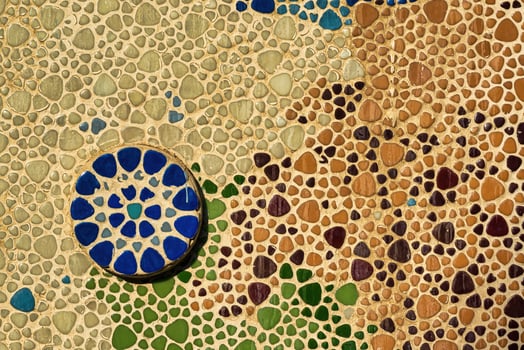 Traditional Islamic ornament. Fragment of a ceramic mosaic. photo