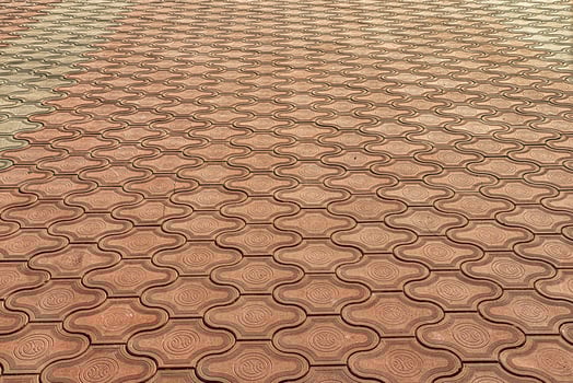 The texture of a tiled pavement with perspective. photo