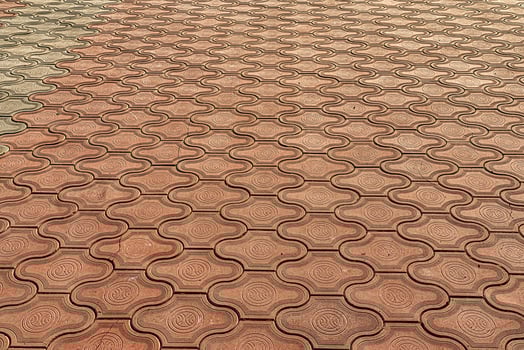The texture of a tiled pavement with perspective. photo