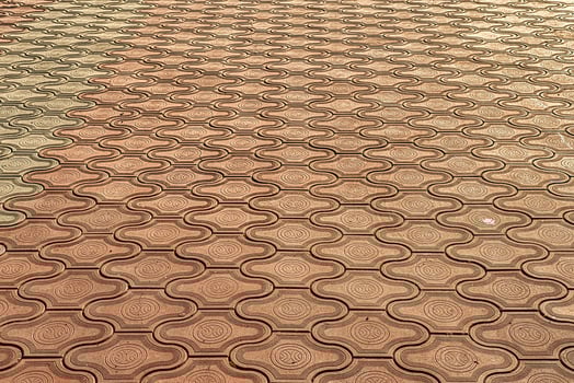 The texture of a tiled pavement with perspective. photo