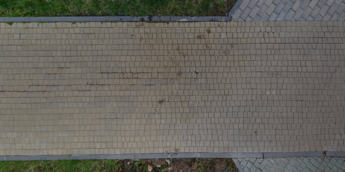 top view of the texture of paving slabs on pedestrian path photo