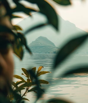 Mountain Overlooking Body of Water photo