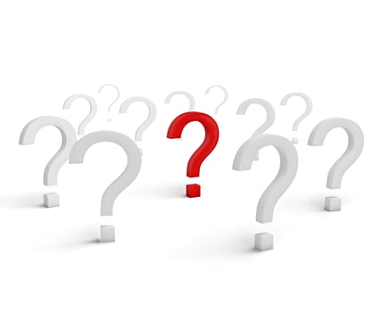 Red question symbol surrounded with white signs isolated photo