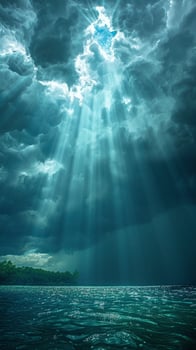 Sunbeams through heavy rain clouds photo