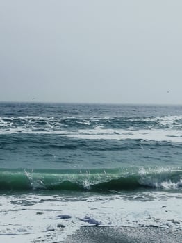 Sea wave surf with white foam. Seascape. Traveling wave photo