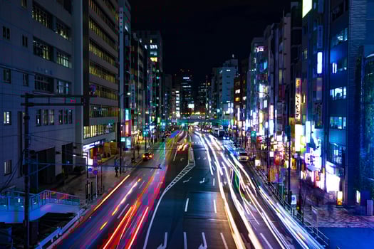 A night neon street at the downtown in Shibuya Tokyo wide shot photo