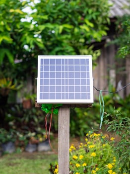 Small size solar cell panels in the garden. Installation photovoltaic for providing light at night photo
