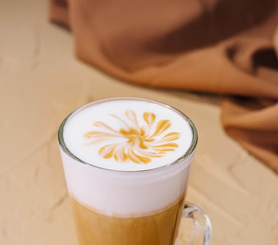 Iced coffee in glass close up photo