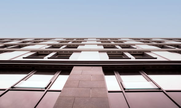 Modern Architectural Detail of Building Facade with Geometric Windows photo