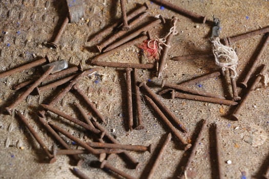 rosted nails in close up photo