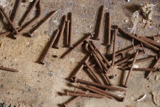 rosted nails in close up photo