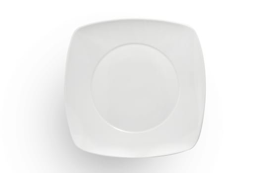 beautiful crockery plate seen from above on white background photo