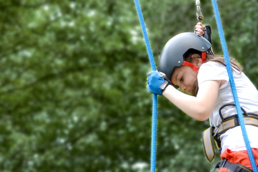 adventure climbing high wire park - people on course in mountain helmet photo