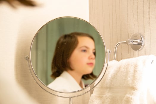 Beautiful girl sexy in a Bathrobe posing in the interior of the room photo