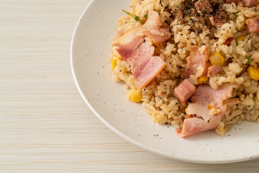 fried rice with bacon ham and black peppers photo