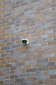 CCTV security camera operating outdoor photo