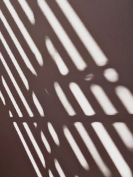Lines of light and shadow on the cement wall. photo