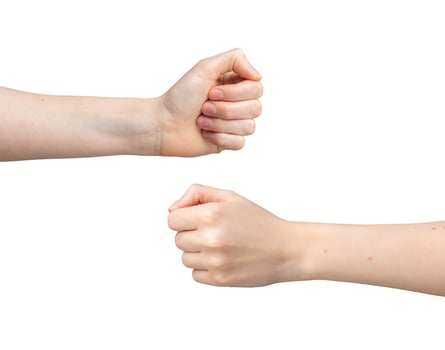 Two hands, white background, fist bump. Team power bro greeting, together in friendship, partnership photo
