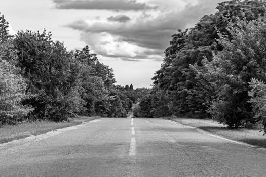 Beautiful empty asphalt road in countryside on light background photo