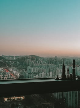Sunset View Over Modern City with Bustling Evening Traffic photo