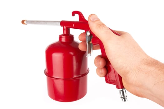 Spray gun on white photo