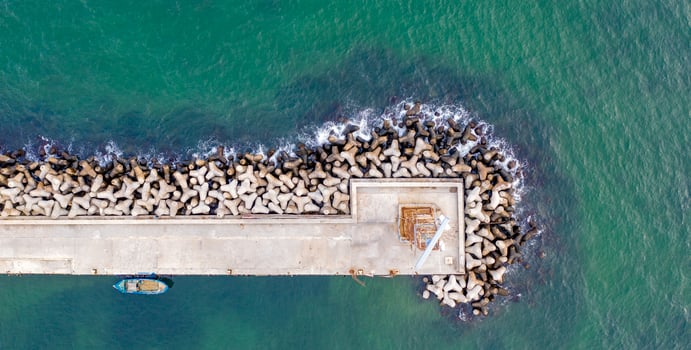 Aerial panoramic view from drone to the breakwater and pier photo