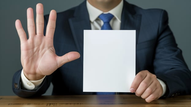 Businessman Presenting Blank Card photo