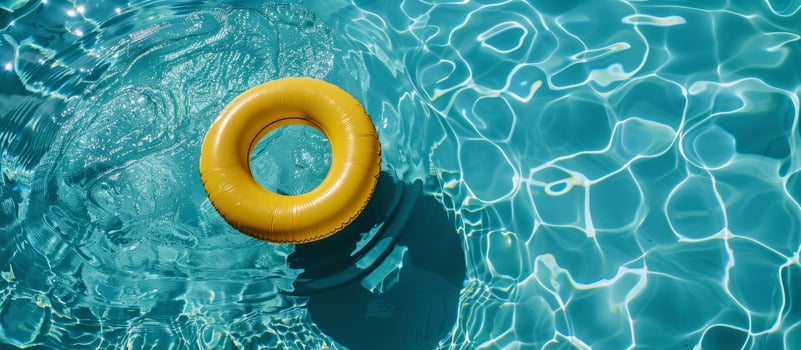 Orange Ring Floating in Water Pool photo