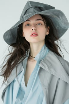 Woman Wearing Gray Hat and Blue Shirt photo