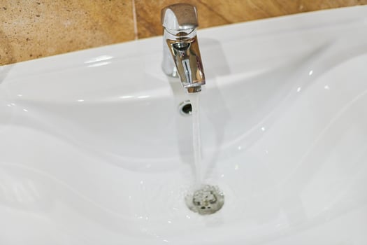 Faucet in bathroom interior. photo
