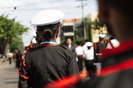 Younger group of a military school in formation to patriot parade of Honduras wearing military clothing and hats. photo