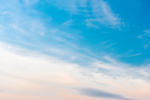 Abstract background. Blue sky with blurry clouds. photo