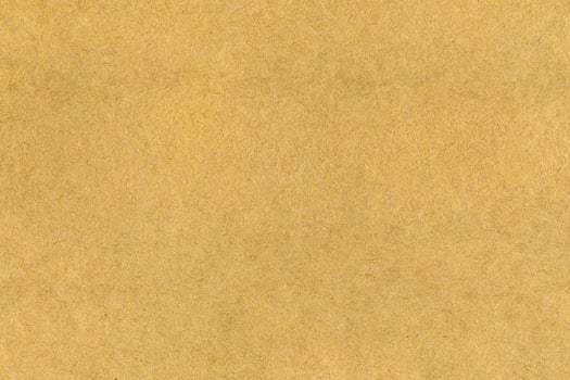 Beige cardboard texture as background photo