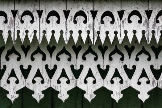 fragment of a wooden carved patterns photo