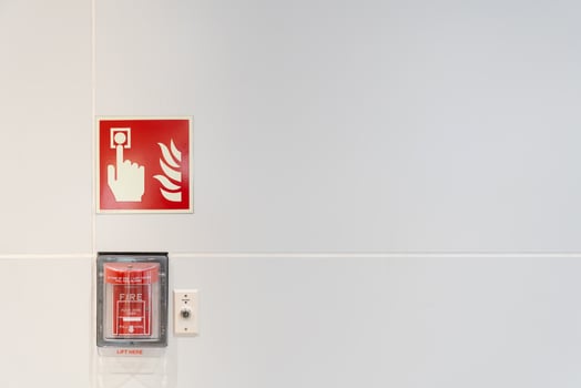 Fire alarm on the wall. fire warning equipment for emergency. copy space. photo