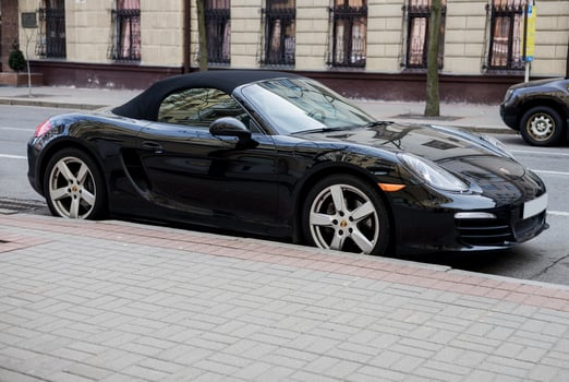 Minsk, Belarus, April 24, 2024 - Elegance roadster Porsche Boxster in city streets photo
