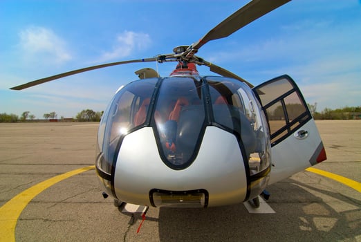 Helicopter standing on the helipad at the airport photo