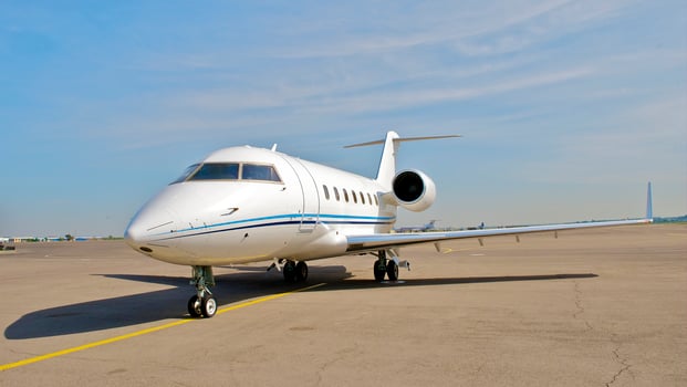 business plane parked at the airport photo