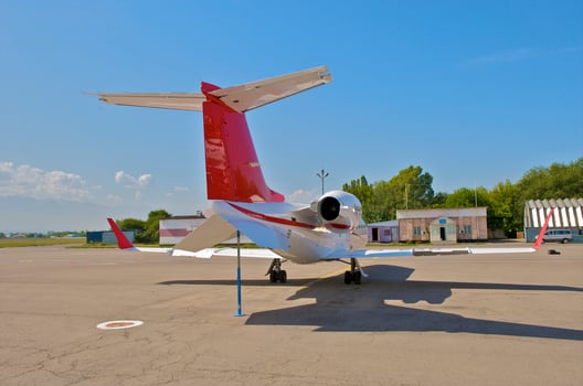 business plane parked at the airport photo